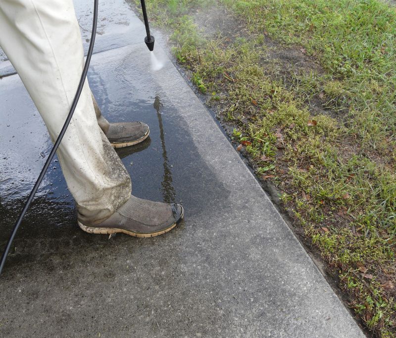 Cleaning concrete surfaces